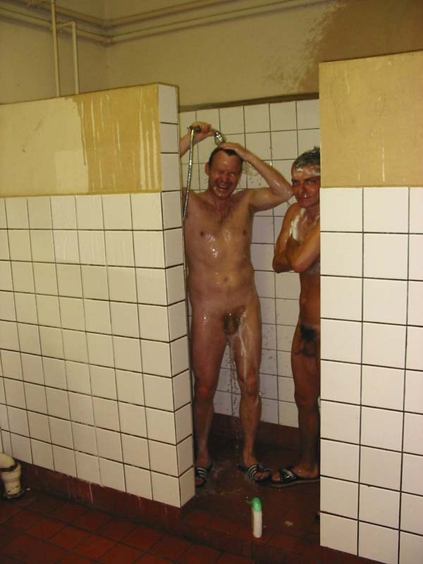 mature sportsmen naked in showers, cock exposed