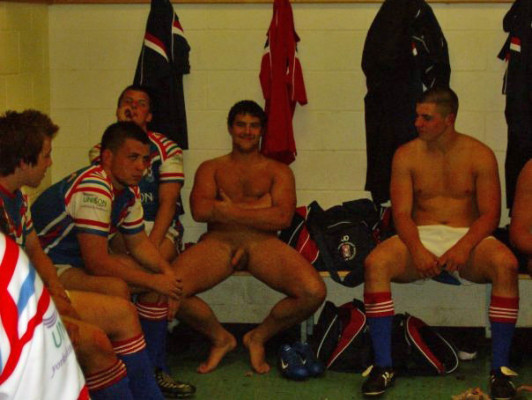 beefy_rugby_player_completely_naked_in_changing_rooms_with_team_mates