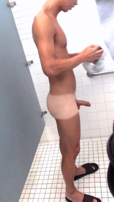 Asian swimmer naked at locker room