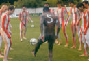 Soccer team posing naked in the field